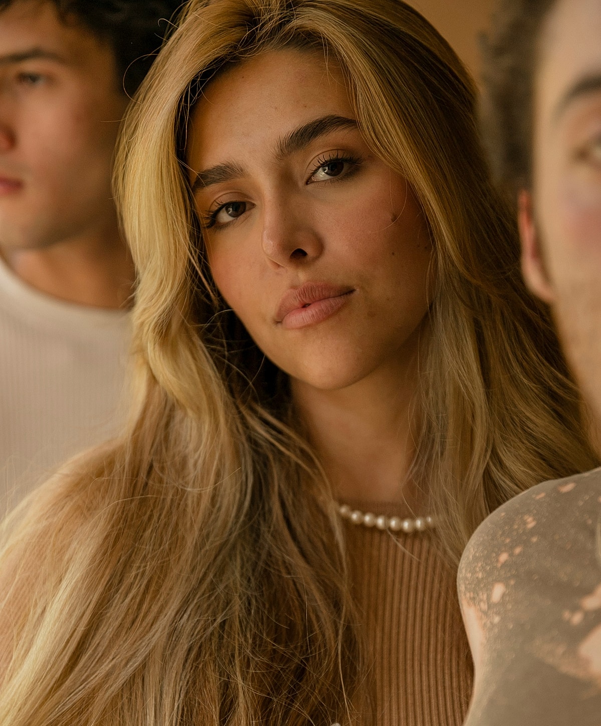 Portrait of a woman with long blonde hair.