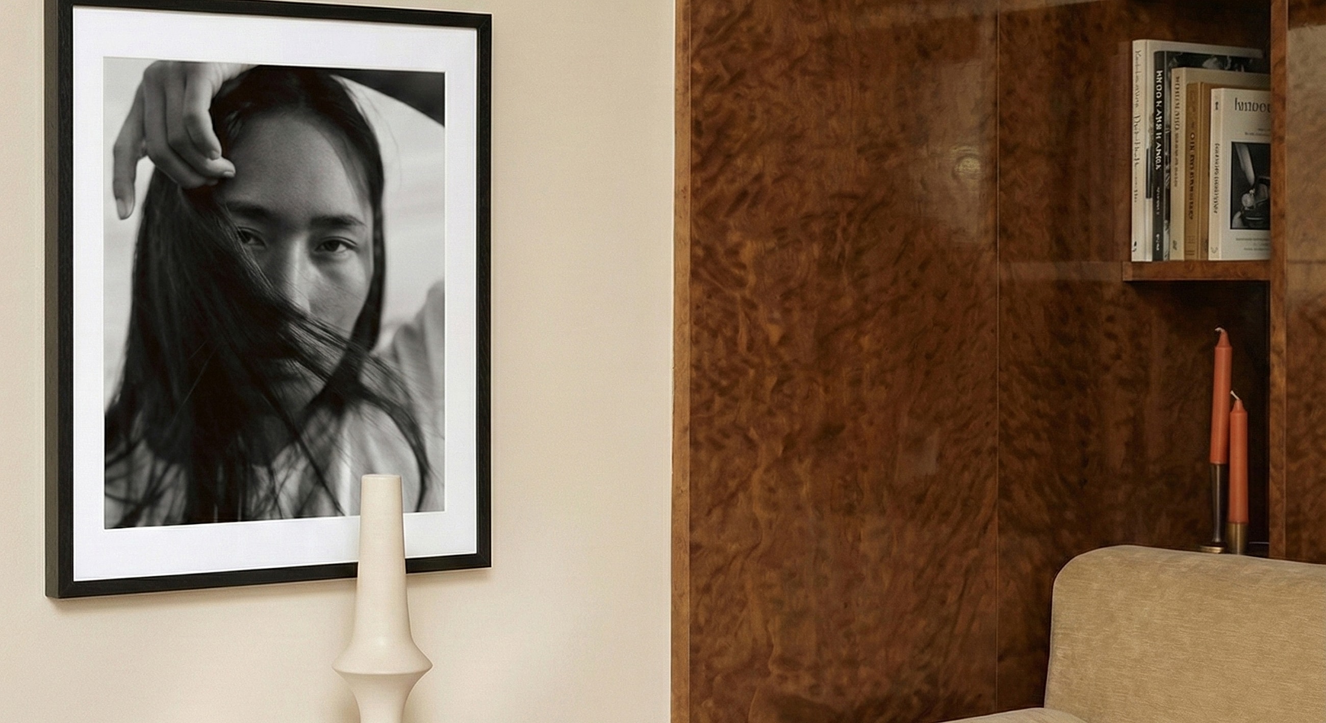 Black and white portrait in elegant interior setting.