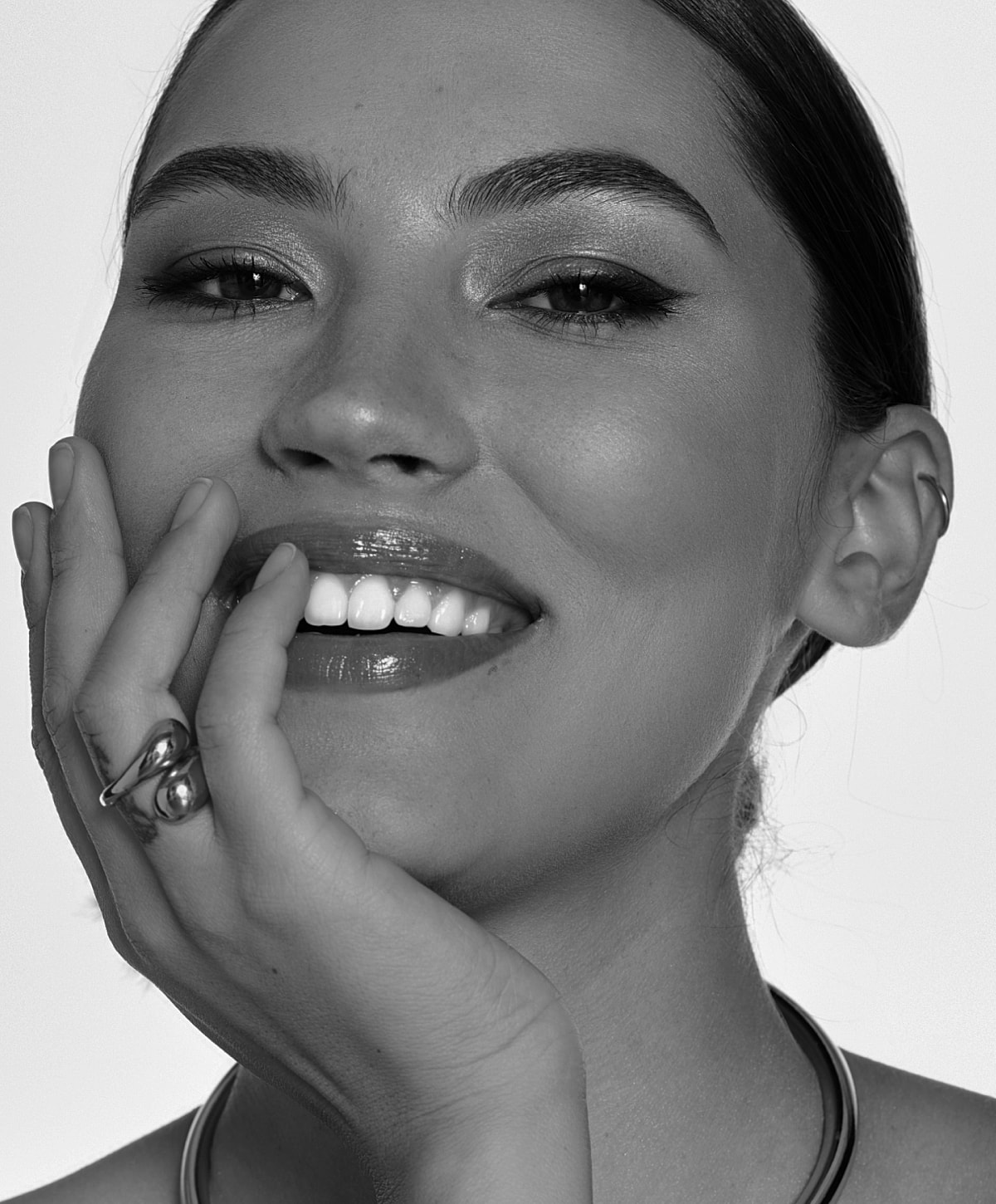 Close-up of a smiling face showing joy.
